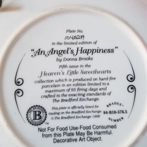 Donna Brooks plate . An angel's happiness.